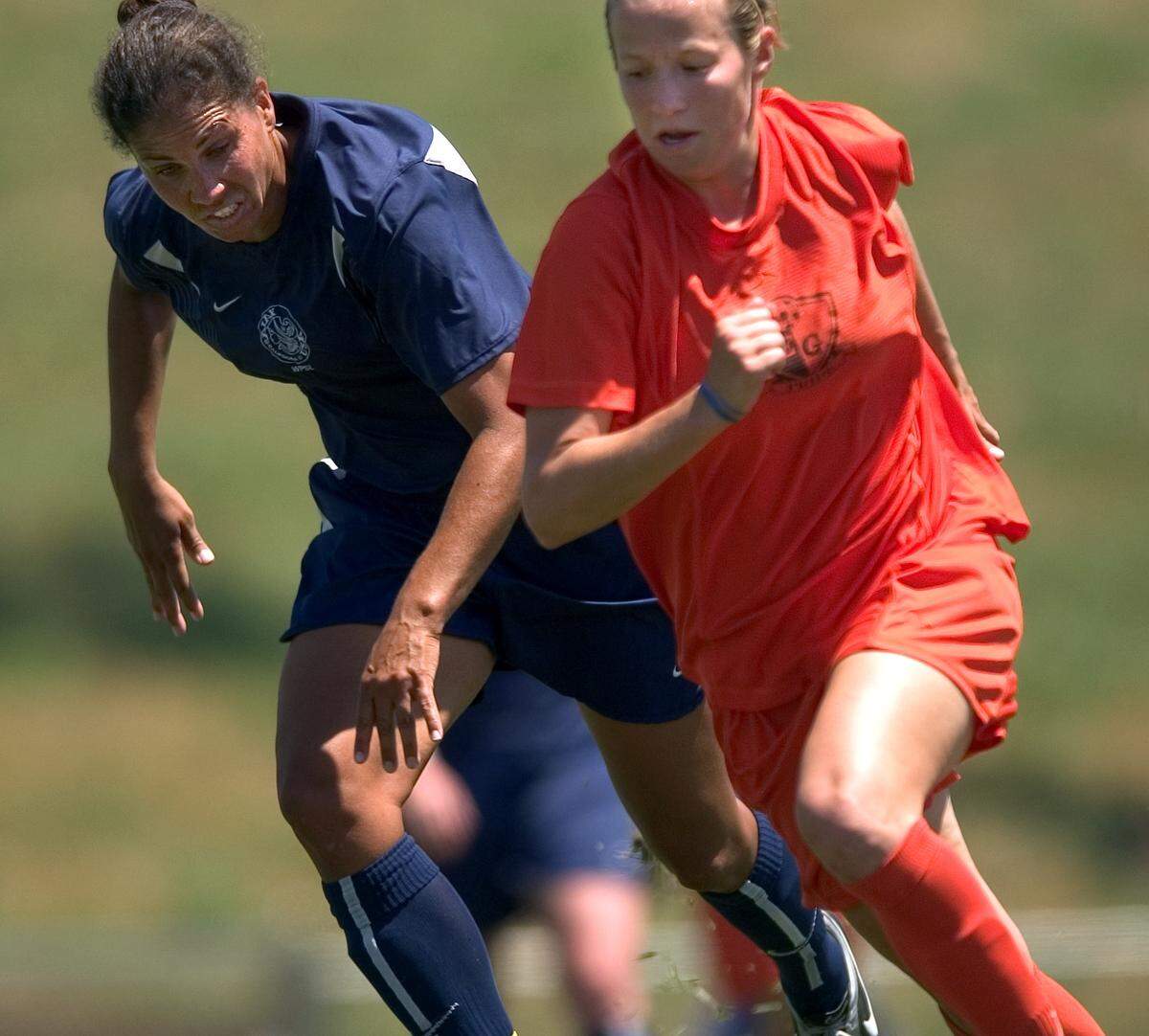Playing for the Elk Grove Pride in 2005, Megan Rapinoe, right, battles Southern California Ajax’s Shannon Boxx for the ball during a Women’s Premier Soccer League match at Cosumnes River College. The Ajax beat the Pride 4-2.