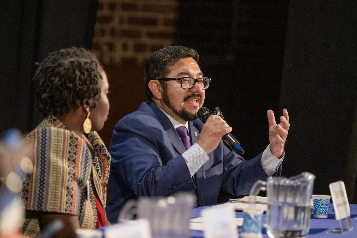 Candidate Eric Guerra responds to a question at the Sacramento County Supervisors District 1 forum on Thursday at the Coloma Center in Sacramento.