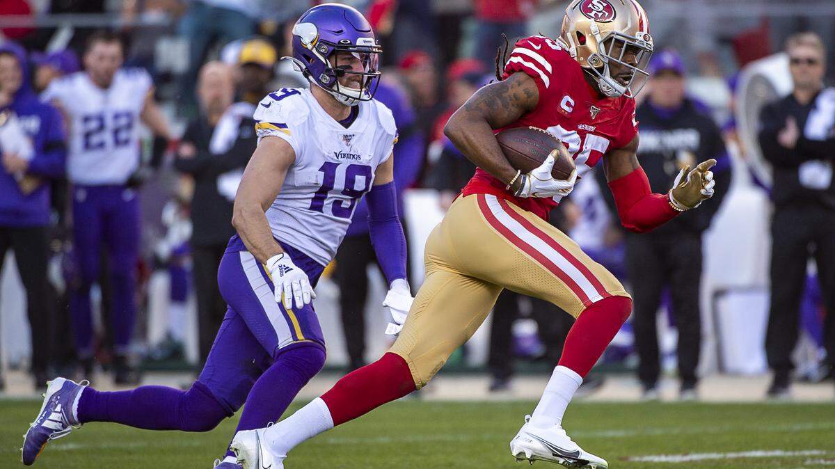 San Francisco 49ers cornerback Richard Sherman (25) returns interception chased by Minnesota Vikings wide receiver Adam Thielen (19) in the sound half during an NFC playoff game at the Levi’s Stadium on Saturday, Jan 11, 2020 in Santa Clara.