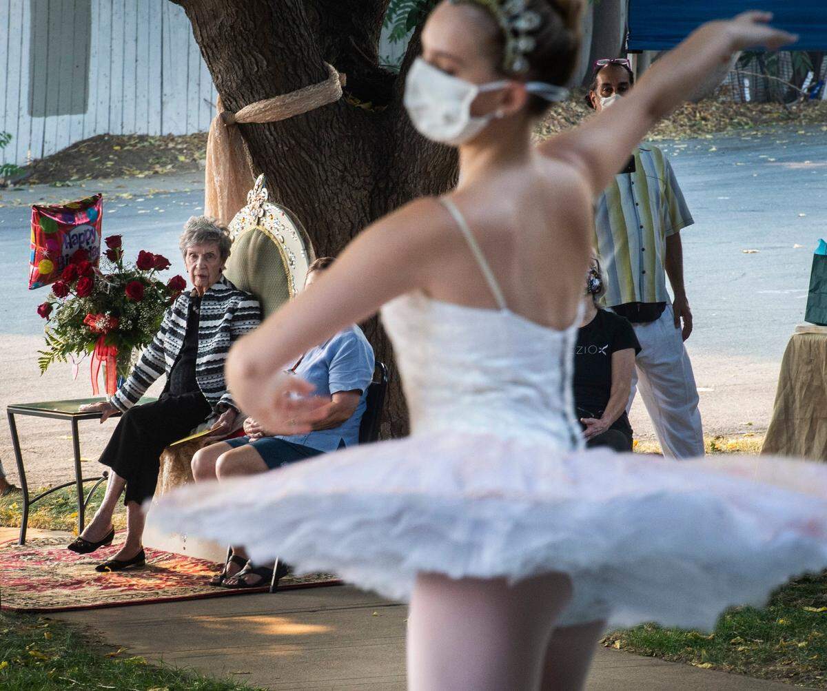 Dancer Molly Gibbs performs outdoors for Barbara Crockett at the studio in East Sacramento on Sunday.