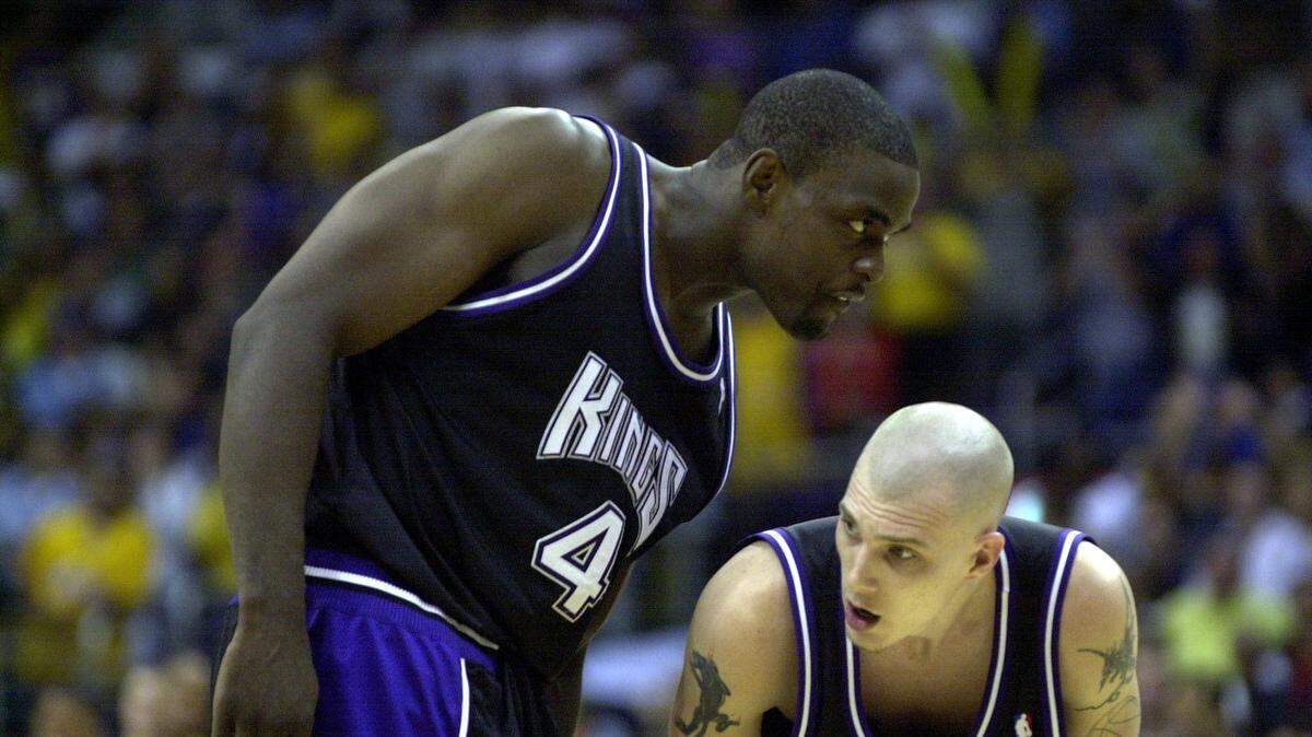 Chris Webber and Jason Williams talk during the fourth quarter in the Western conference playoff game 1 between the Sacramento Kings and the Los Angeles Lakers Sunday, May 6, 2001 at Staples Center.