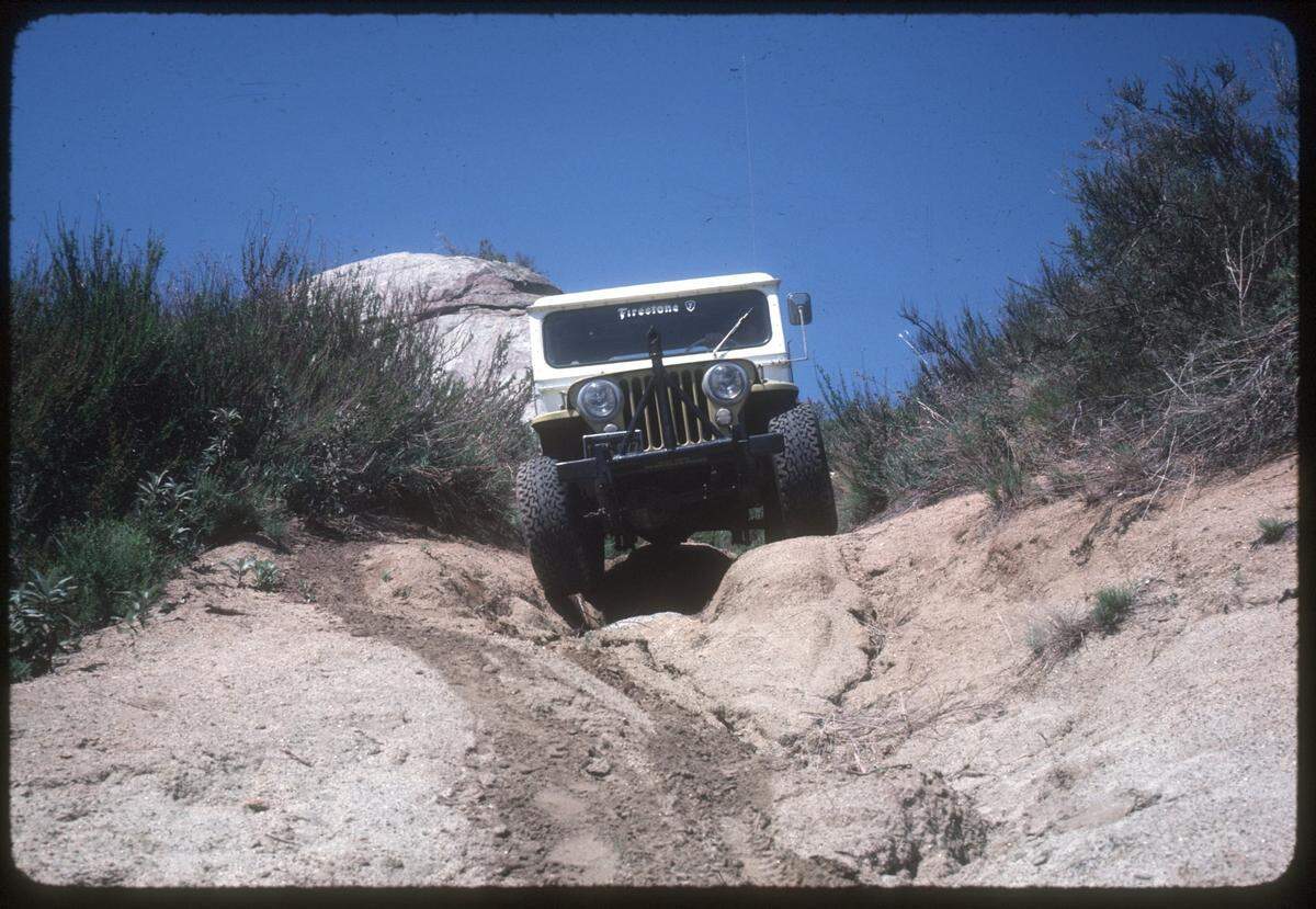 A jeep climbs a hill at Hollister Hills State Vehicular Recreation Area.
