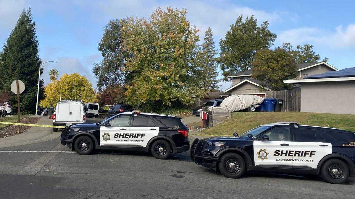Investigators on gather evidence Thursday at the scene of a fatal shooting where Sacramento County sheriff’s deputies shot to death a man who reportedly fired a gun at them in the 6800 block of Ashfield Way in Carmichael.