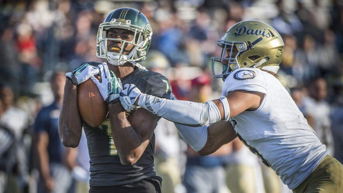 Sacramento State receiver Andre Lindsey, left, led all Football Championship Subdivision players last season when he averaged 30.24 yards per catch.