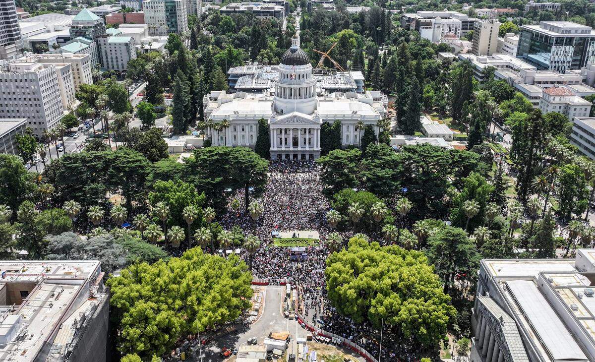 A crowed estimated to be larger than 5,000 people gathers during the “No Kings” protest against the Trump administration at the state Capitol on Saturday, June 14, 2025. 