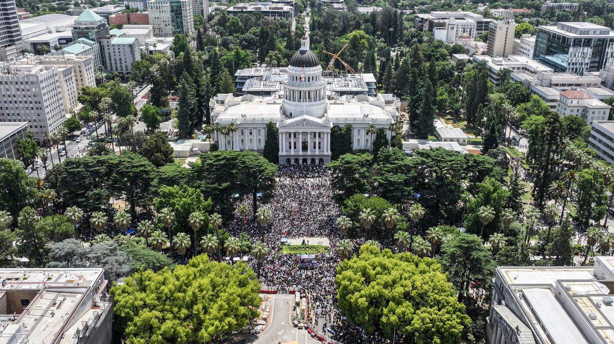 A crowed estimated to be larger than 5,000 people gathers during the “No Kings” protest against the Trump administration at the state Capitol on Saturday, June 14, 2025.