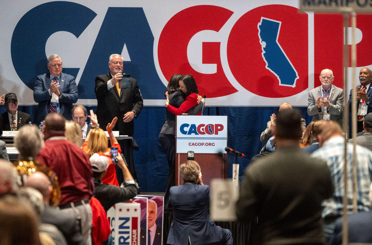 Jessica Millan Patterson hugs Corrin Rankin as she’s named the new Republican Party chairwoman at the CAGOP spring organizing convention in Sacramento on Sunday.