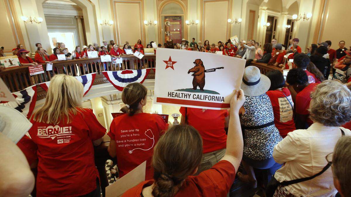 Members of the California Nurses Association and supporters rally at the state Capitol in June 2017 to call for a single-payer health plan.