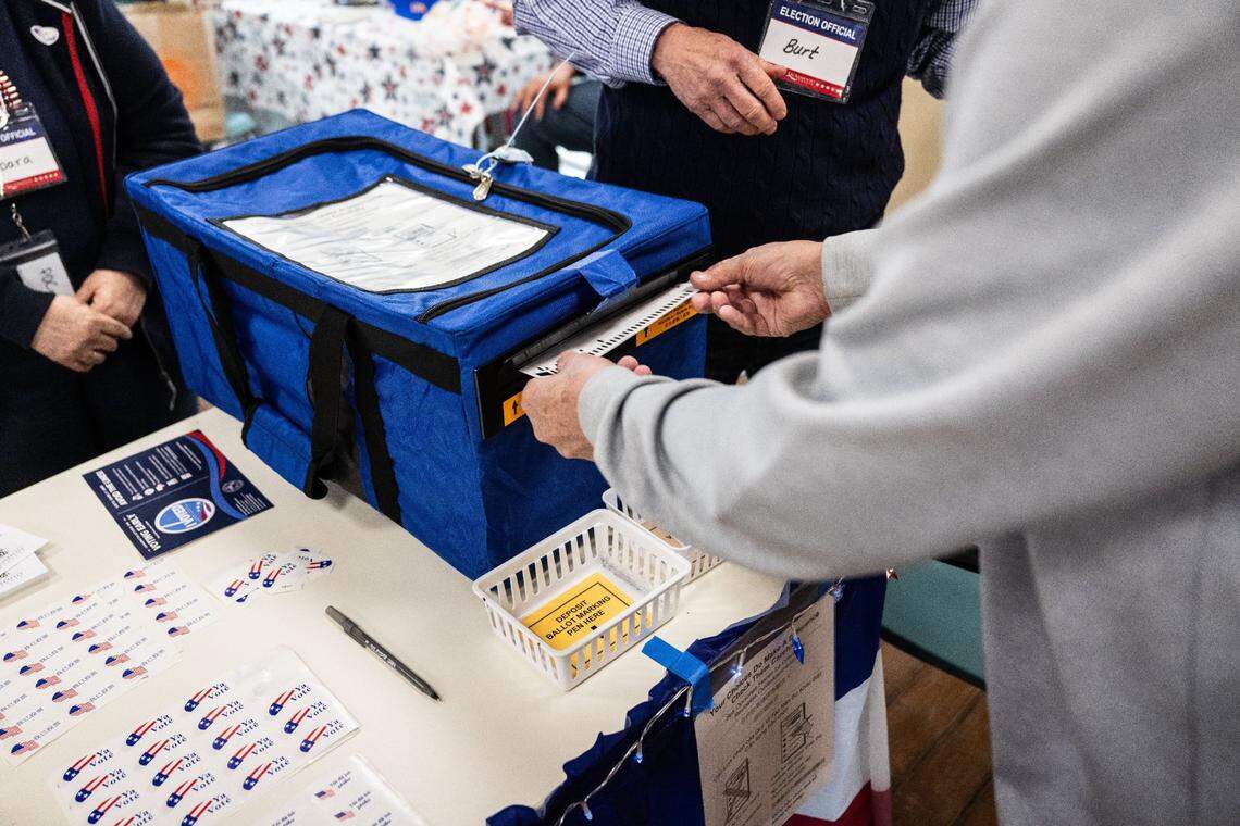 Greg Purcell, of Sacramento turns in this ballot at the Robbie Waters Pocket-Greenhaven library on Tuesday, March 5, 2024.