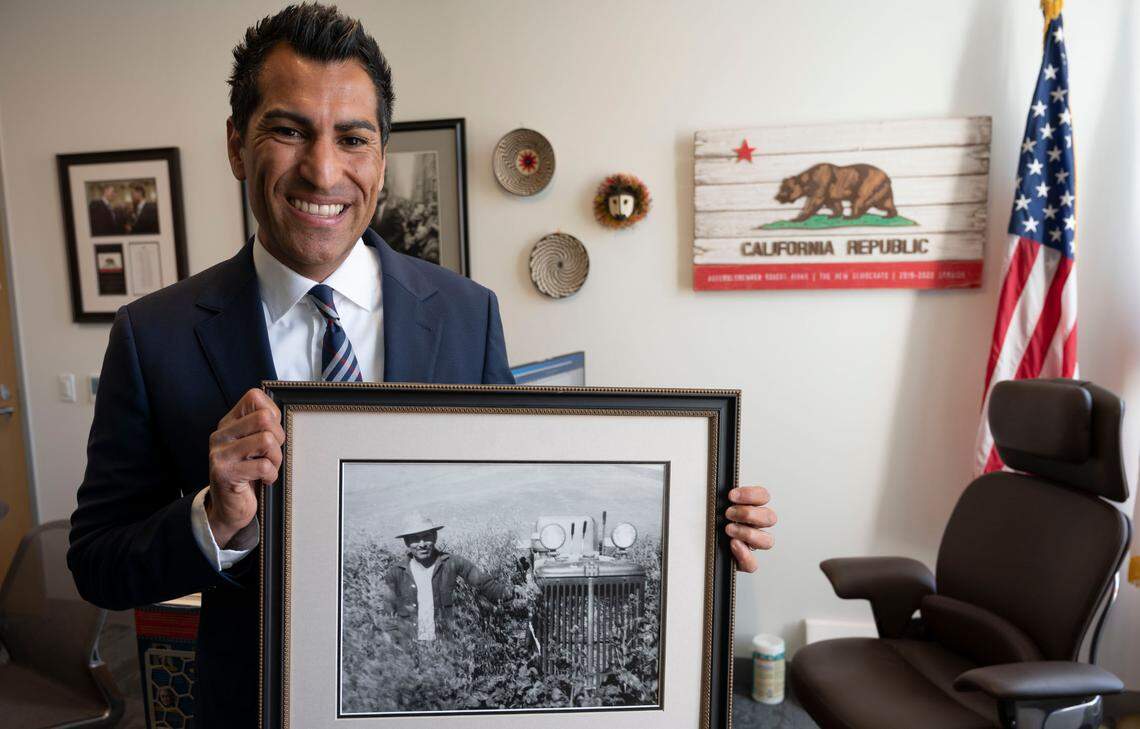 Assemblyman Robert Rivas holds a photo of his grandfather, Servando Flores, who worked with Cesar Chavez and the UFW as a leader in the fight to win equal rights for farmworkers. Rivas will become the new Speaker of the California State Assembly on June 30.