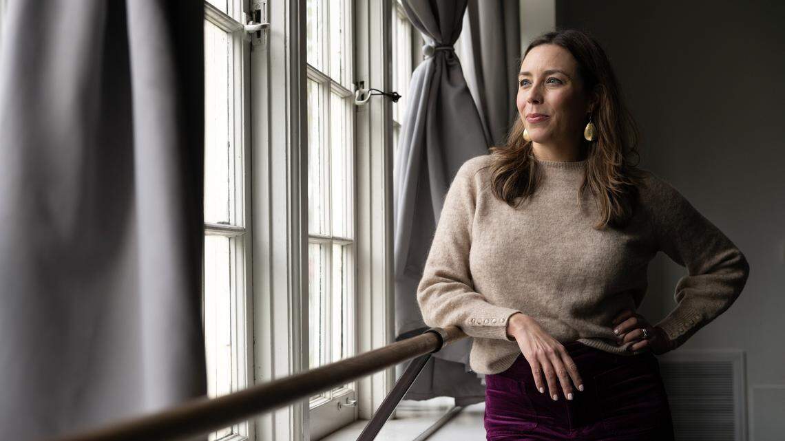 Sacramento Ballet Executive Director Kiera Anderson poses in a dance studio at the company’s headquarters in Sacramento on Wednesday, a few weeks after being named to the position. A search for a new artistic director is ongoing.