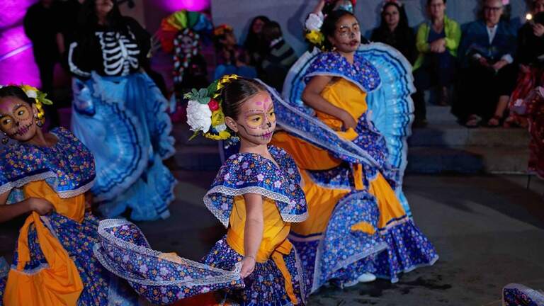 New exhibit slated for Dia de los Muertos party at California Museum. What is it?