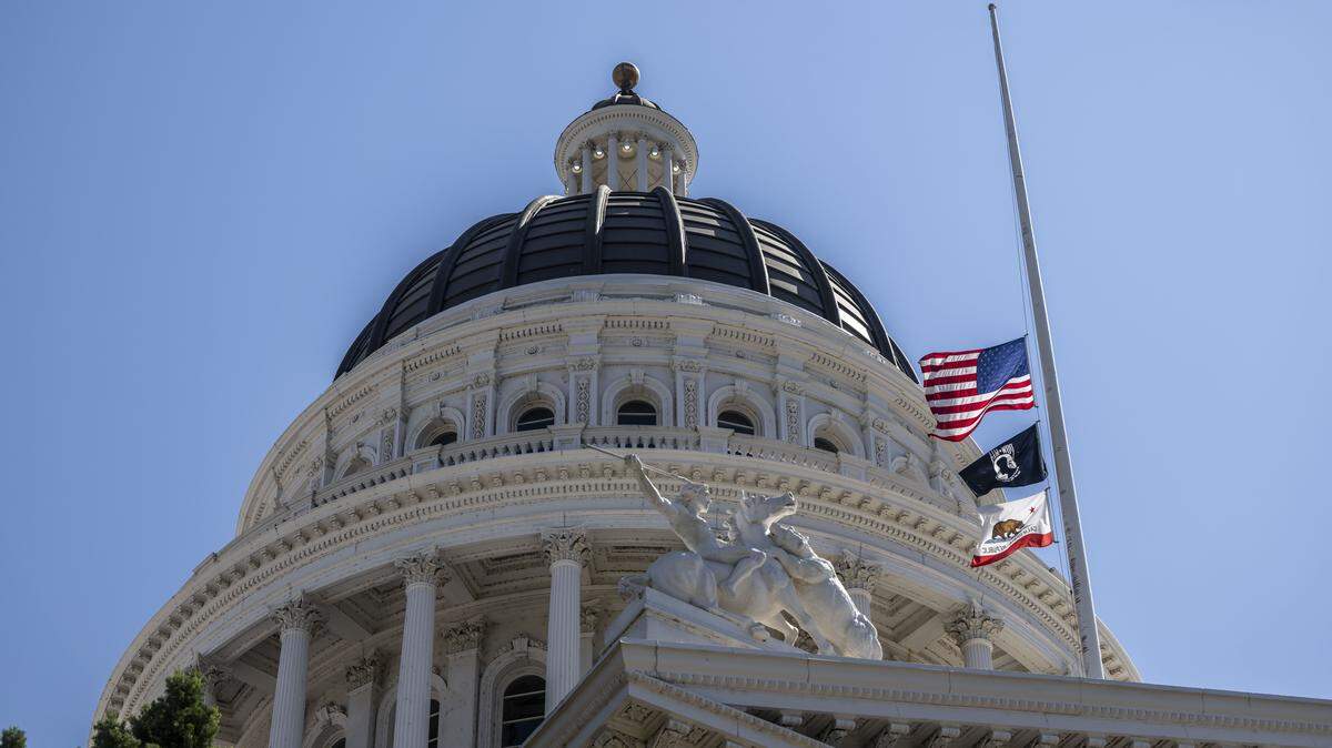 Flags are flown at half-staff on Friday, Sept. 12, 2025, at the state Capitol. Gov. Gavin Newsom ordered flags at the Capitol to be lowered in the wake of the Stockton shooting that killed four people and wounded 11 others.