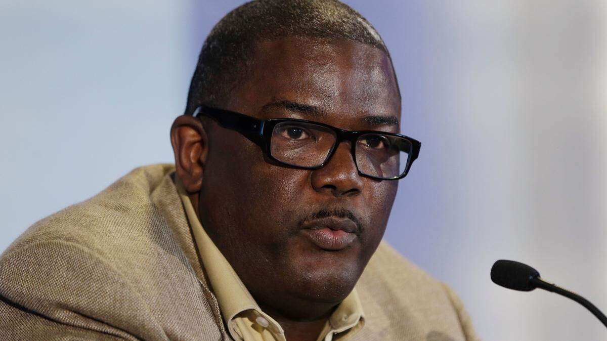FILE - In this July 16, 2013, file photo, Joe Dumars, then the Detroit Pistons’ president of basketball operations, speaks during a news conference in Auburn Hills, Mich. Dumars has joined a sports agency. Independent Sports and Entertainment announced Tuesday, Aug. 1, 2017, it had hired Dumars to run its basketball division, which includes clients such as New Orleans Pelicans’ DeMarcus Cousins. Dumars says he looks forward to beginning the new chapter of his career. (AP Photo/Carlos Osorio, File)