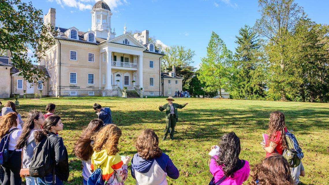 National parks across the country are still overflowing with tourists — and to beat the crowds, some have opted to visit less popular parks instead, data shows. These students are visiting the Hampton National Historic Site in Maryland.