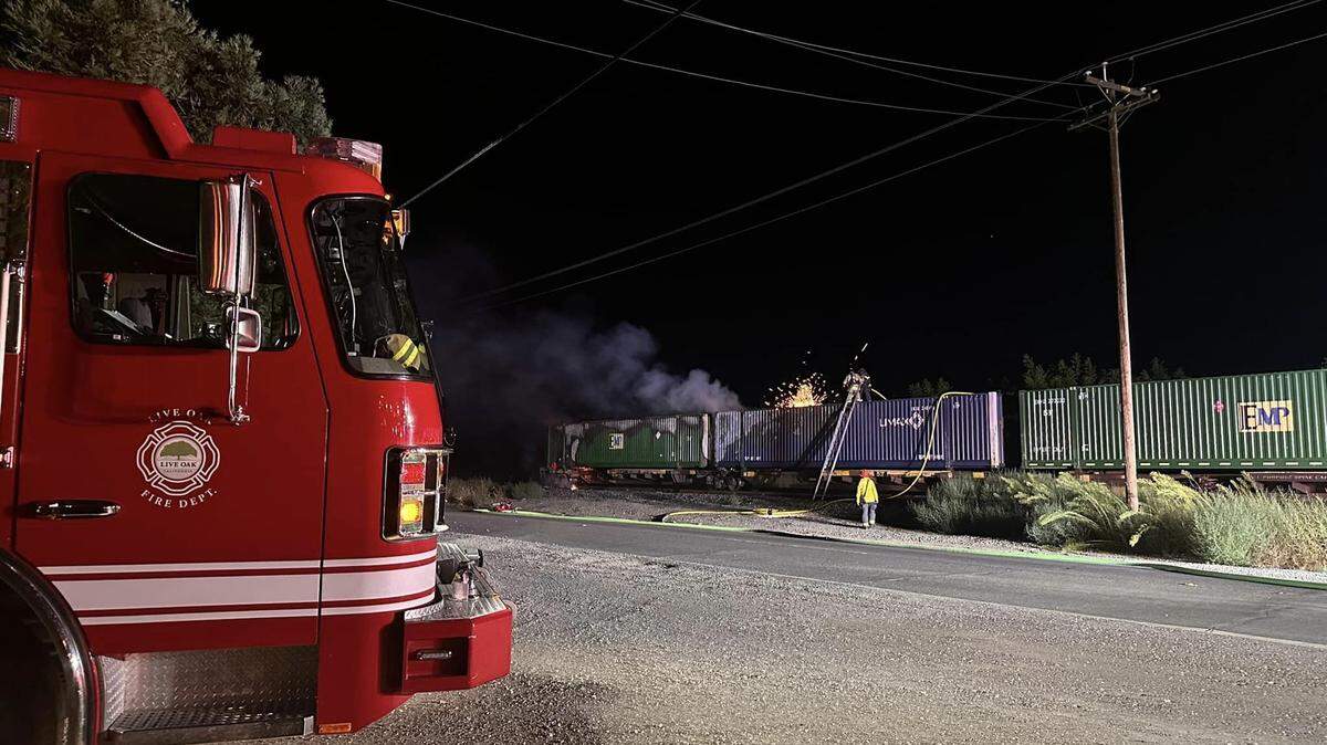 Authorities respond to a train car fire early Monday morning. Live Oak Boulevard will be closed for most of the day, Sutter County authorities said.