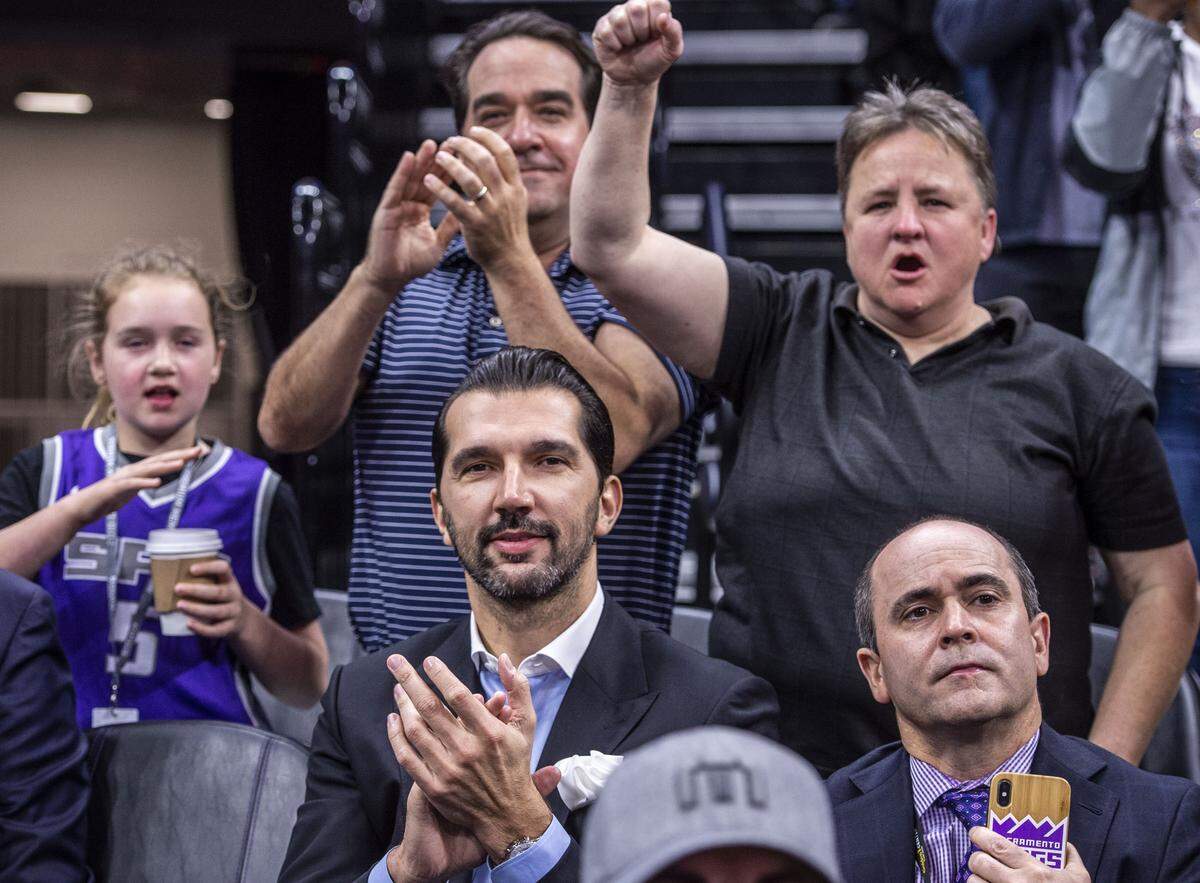 Peja Stojaovic and fans celebrate Sacramento Kings guard Buddy Hield (24) after he passed his season 3-point record against the Phoenix Suns on Saturday, March 23, 2019 during their game at the Golden 1 Center in Sacramento, Calif.