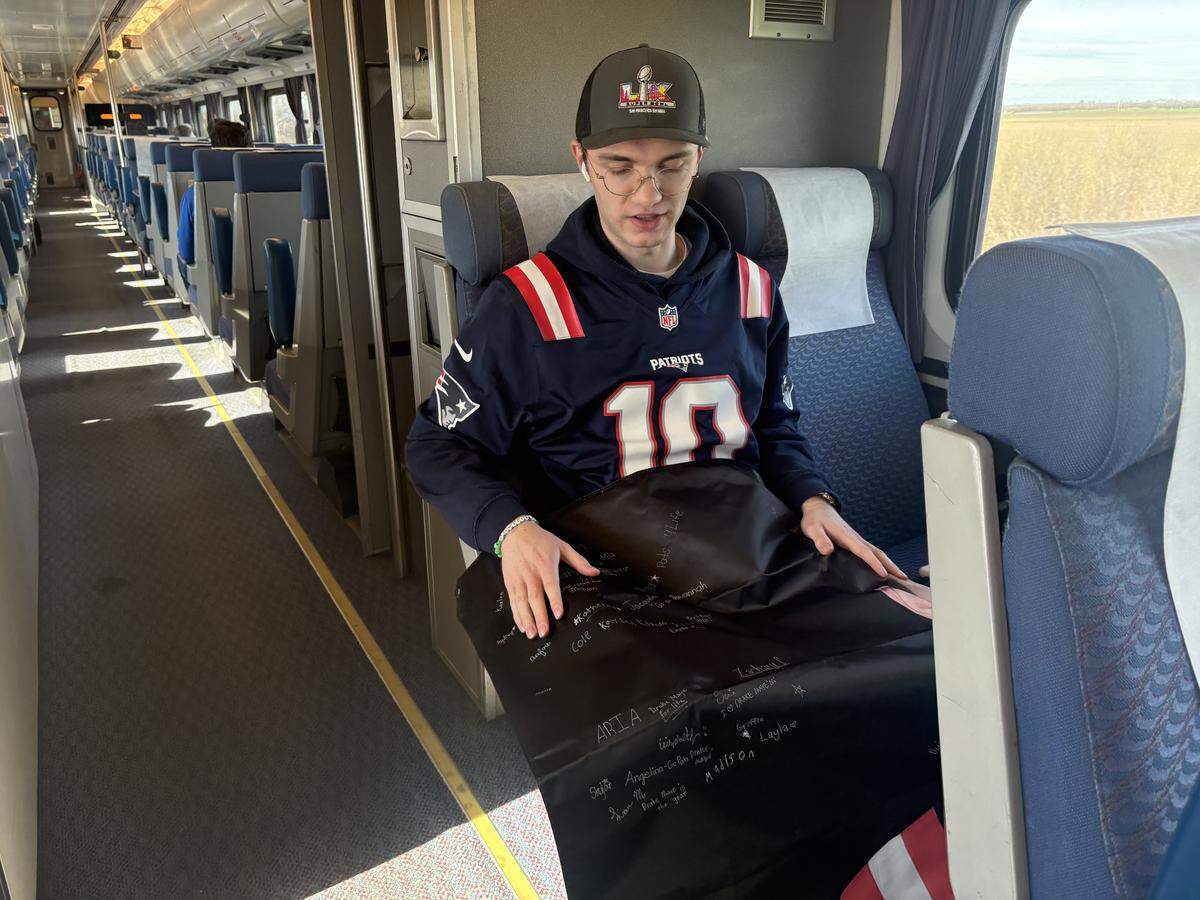 Zach Fillmore, 22, a middle school teacher from New England, rides the Amtrak train from Sacramento to Santa Clara to watch Super Bowl LX at Levi’s Stadium. During the 2026 FIFA World Cup, Amtrak will provide fans direct access to the stadium along the Capital Corridor line.