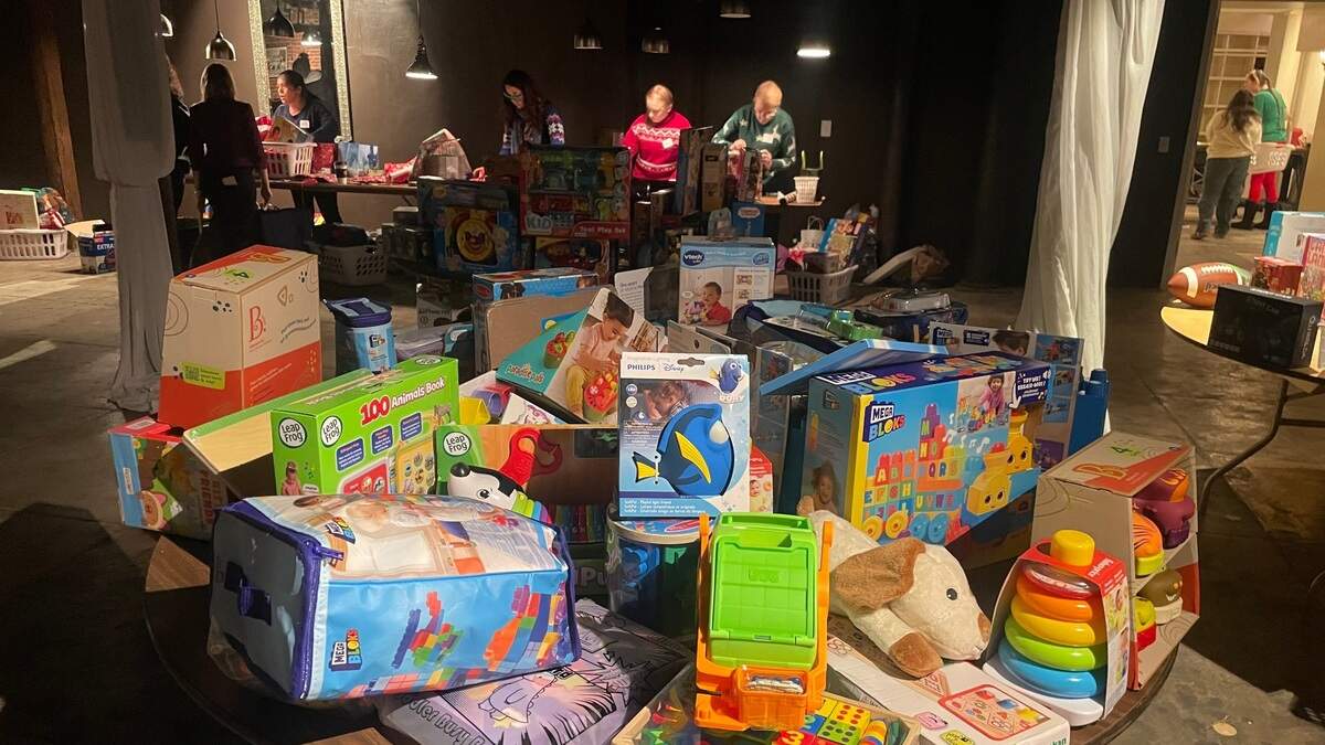 A table with gifts donated by corporate sponsors and individual donors at Women’s Empowerment’s annual craft holiday party Saturday at Capitol Plaza Ballrooms in downtown Sacramento.