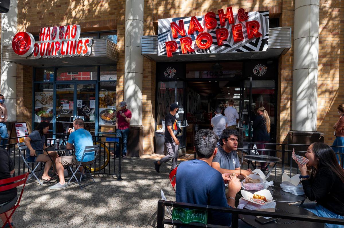 Nash and Proper customers eat at the restaurant on Thursday, Sept. 24, 2020, on K Street in downtown Sacramento. Hot chicken shop Fire & Crisp is opening in the location after Nash and Proper closed down.