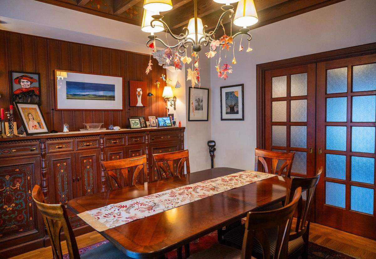 The cabinet doors in the dining room of noted Sacramento architect Leonard F. Starks’ home, which he designed in the 1930s, feature painted panels that match motifs in the ceiling, according to current owner Peter Saucerman.