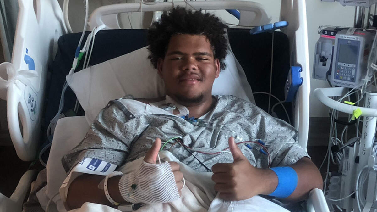 Capital Christian High School football player Trevor Loveall awoke in the hospital Wednesday, four days after collapsing during a scrimmage.