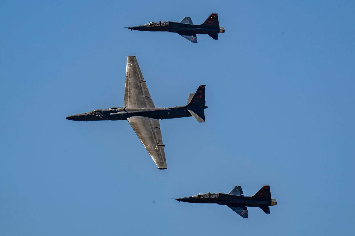 A U-2 Dragon Lady reconnaissance plane is escorted by two T-38 Talon training aircraft during the Air & Space Expo at Beale Air Force Base on Saturday, June 7, 2025. The base is home to both types of planes.