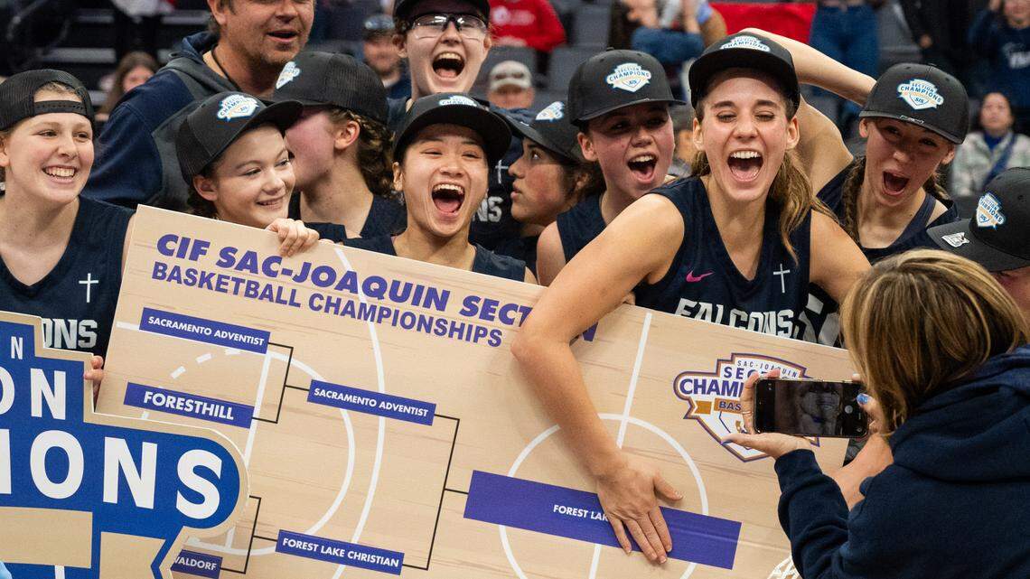 The Forest Lake Christian Falcons celebrate their CIF Sac-Joaquin Section Division VI girls basketball championship on Friday at Golden 1 Center.