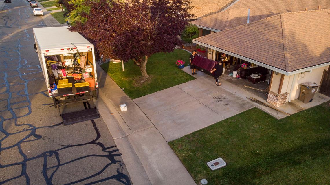 A moving truck stands in front of a house near Wackman Park in Elk Grove, Wednesday, May 29, 2019. The house was sold to a couple that sent a “love letter” to the home seller that told their story as first-generation home buyers and their plans to raise a family.