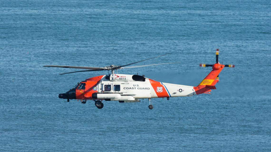 The Coast Guard pulled two people from the water after a boat capsized in Oregon, officials said.