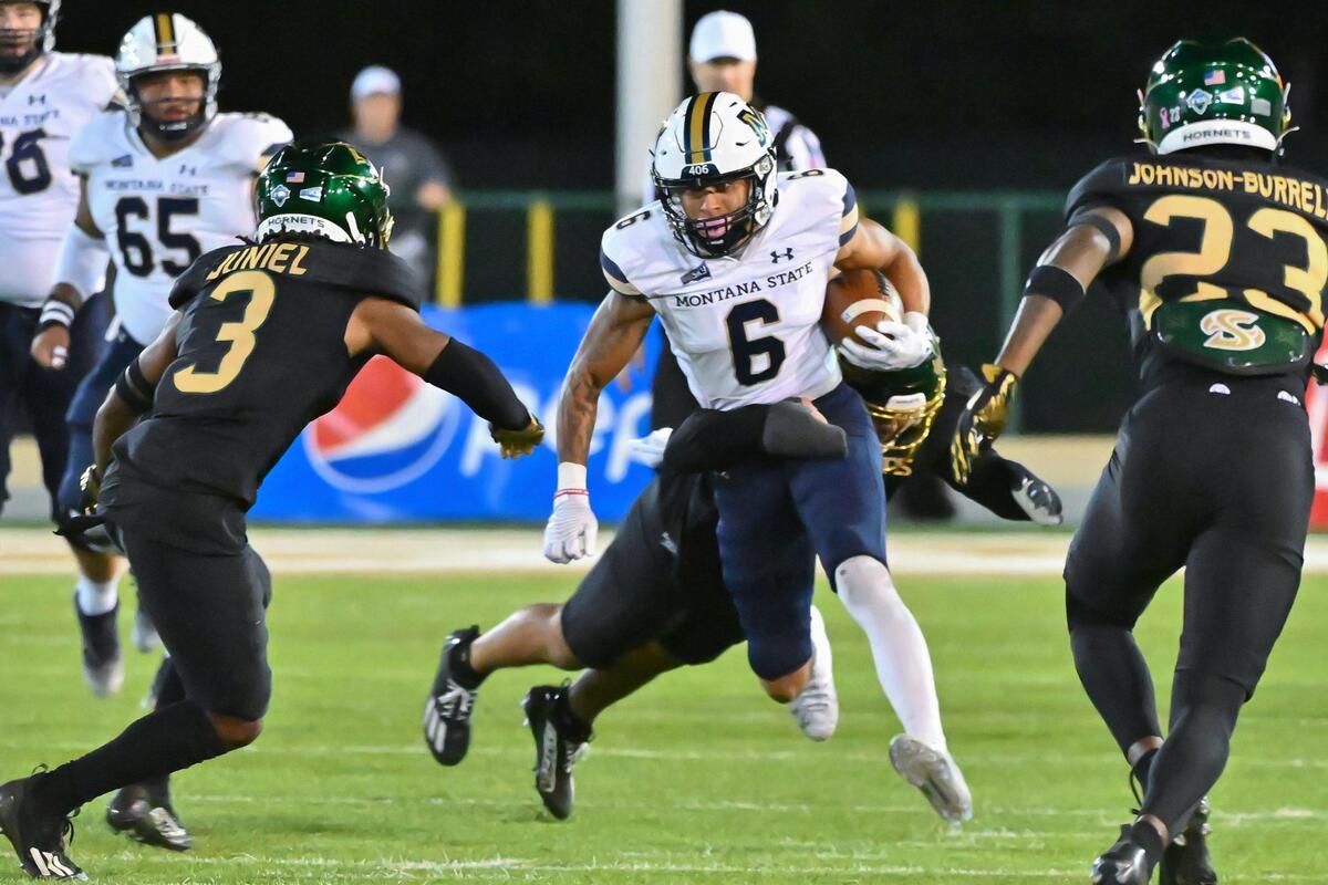 Montana State Bobcats wide receiver Ty McCullouch (6) runs the ball for a first down before being tackled by Sacramento State Hornets cornerback Darian Pollard (14) in the first half of the NCAA football game at Hornet Stadium on Saturday, Oct. 21, 2023.