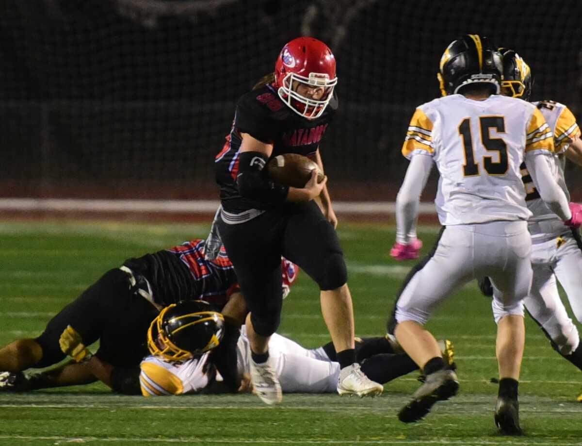 Mira Loma's Frankie Arizmendez carries the ball in the first half against Delta in a CIF Sac-Joaquin Division VIII semifinal game Friday, Nov. 21, 2025, at El Camino High School in Arden Arcade, Calif. Arizmendez had 18 carries for 136 yards and a touchdown, and the top-seeded Matadors defeated the Saints, 48-34.