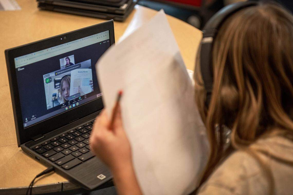 Emiliia shows her work to the virtual reading tutor with the Yolo Kids Read program at Bell Avenue Elementary earlier this month.