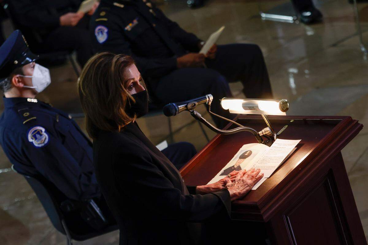 Speaker Nancy Pelosi speaks during a ceremony for late Capitol Police officer Brian Sicknick as he lies in honor during a ceremony as people pay their respects in the Rotunda of the Capitol building on Feb. 3, 2021, in Washington, D.C. The police officer, who died after being injured in the Jan. 6 attack by pro-Trump rioters, will lie in honor at the building's rotunda, a mark of respect rarely bestowed. 