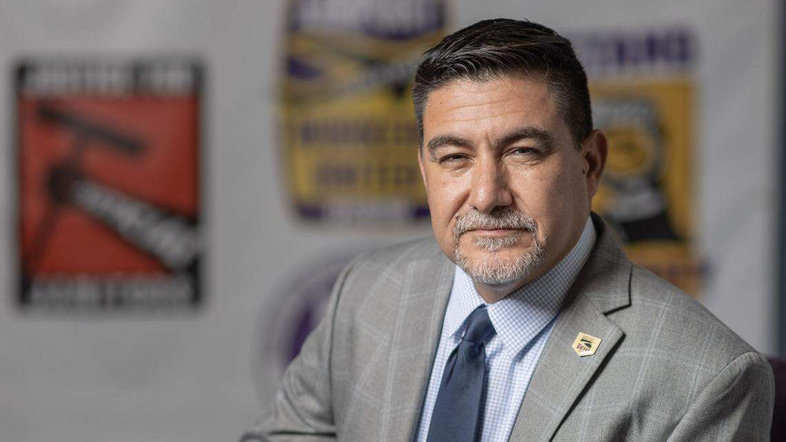 David Huerta of SEIU-USWW, seen posing for a photo in 2022, is in federal custody after being injured and arrested during a Los Angeles immigration protest Friday.