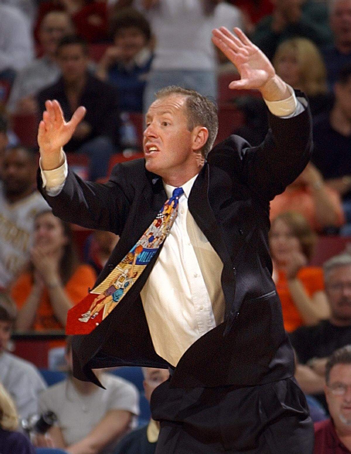 Foothill High School basketball coach Drew Hibbs directs his team during its 66-62 CIF State Division III championship win over the Harvard-Westlake Wolverines at Arco Arena on March 22, 2003.