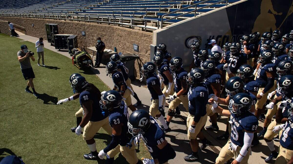 UC Davis takes the field against Idaho State before the college football game Saturday, March 27, 2021, at UC Davis Health Stadium.