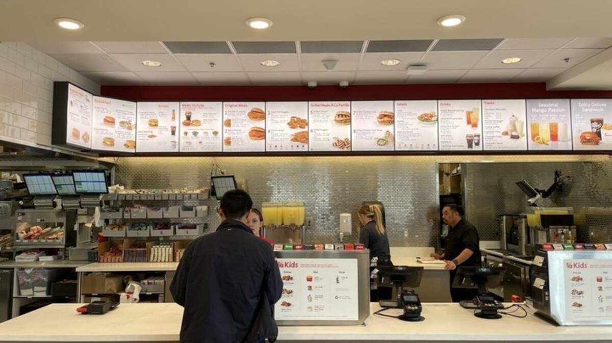 A customer orders food at Chick-fil-A on Tuesday, Feb. 20, 2024, at 2101 Alta Arden Expressway. The fast-casual chain reopened its only location in Arden Arcade after six months of reconstruction.