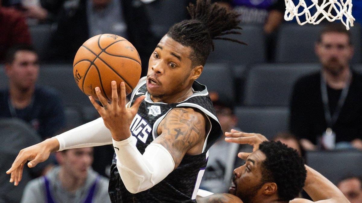 Sacramento Kings forward Richaun Holmes (22) rebounds the ball over New Orleans Pelicans forward Derrick Favors (22) during the second period of their NBA game Saturday, Jan. 4, 2020, at Golden 1 Center in Sacramento.