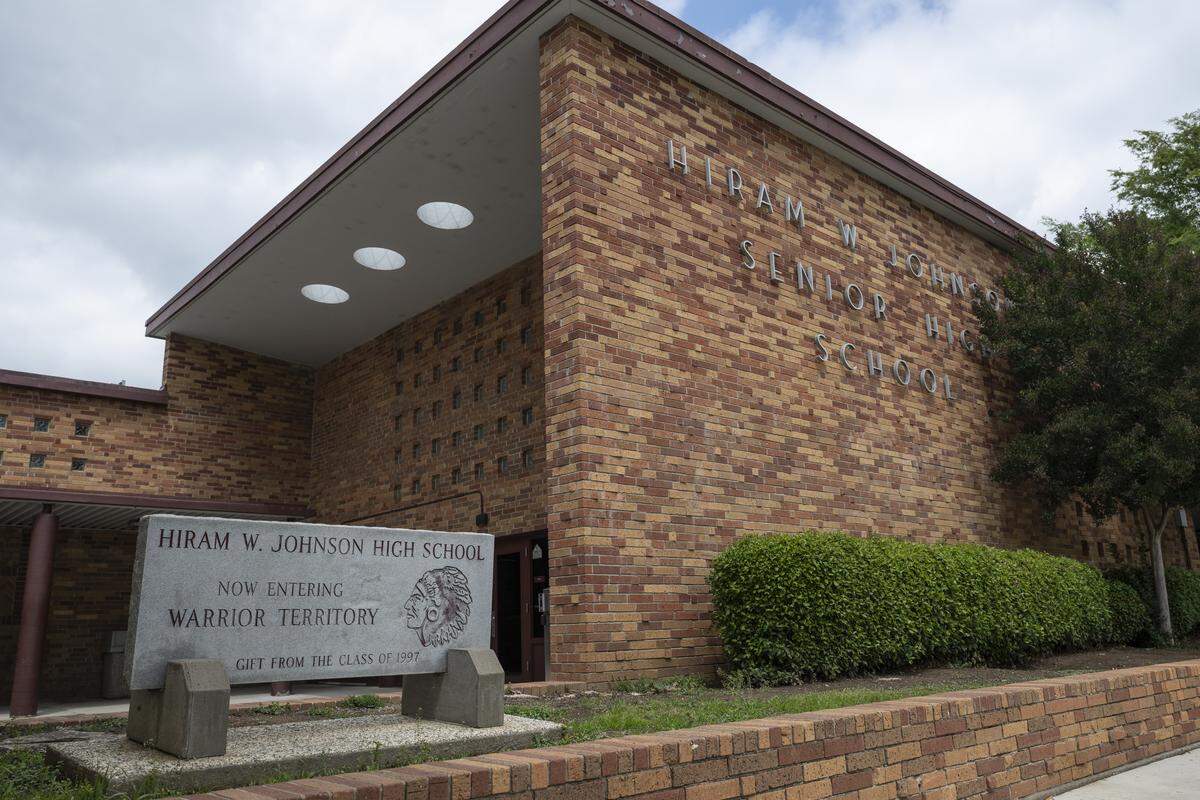 A stereotypical Native American warrior motif decorates a sign in front of Hiram Johnson High School in Sacramento on Tuesday.