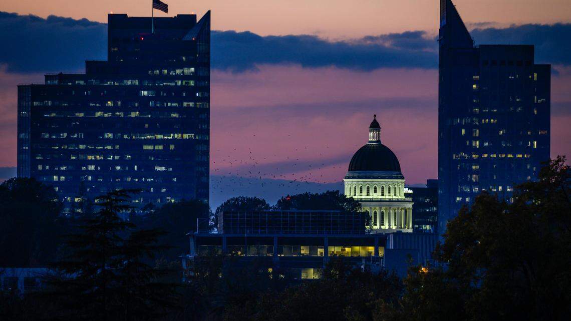 The Capitol dome glows on Thursday, Nov. 14, 2019, after the sunset in downtown Sacramento.