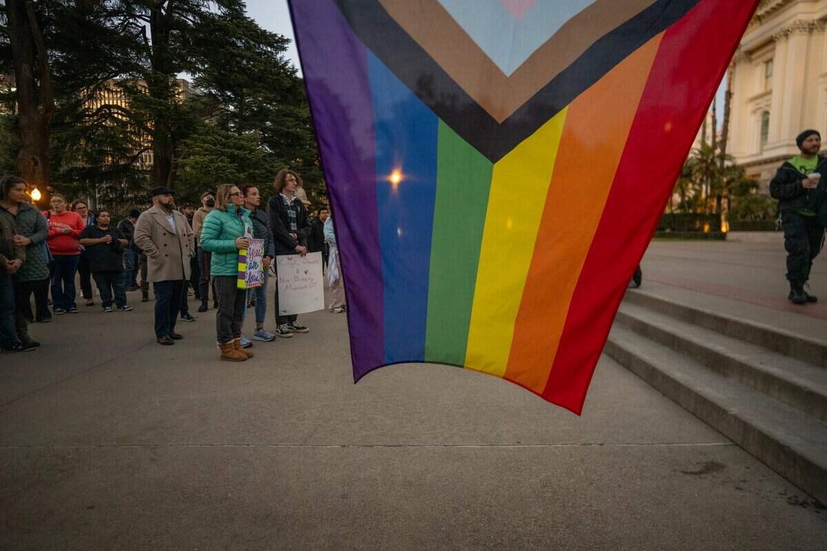 A pride flag waves at a transgender unity rally at the California Capitol on Thursday.