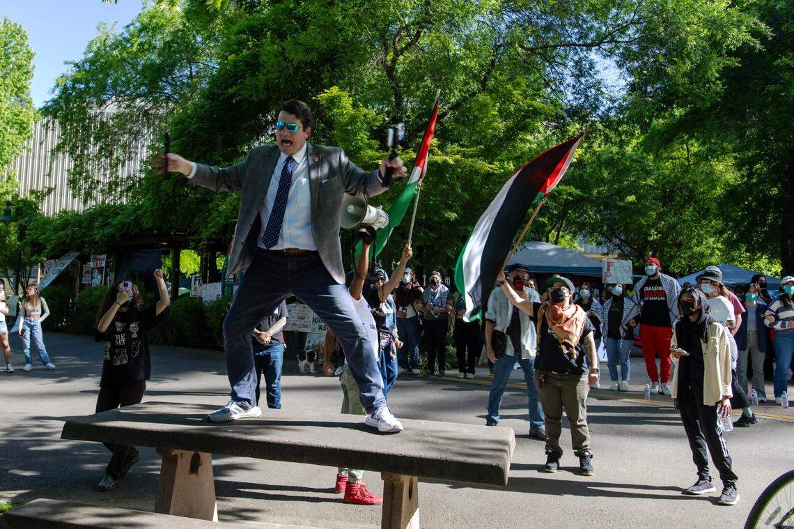 A counter-protester antagonizes pro-Palestinian activists on Tuesday, April 30, 2024, outside their tent encampment at Sacramento State. The protesters are asking the university to divest from investments in Israel.