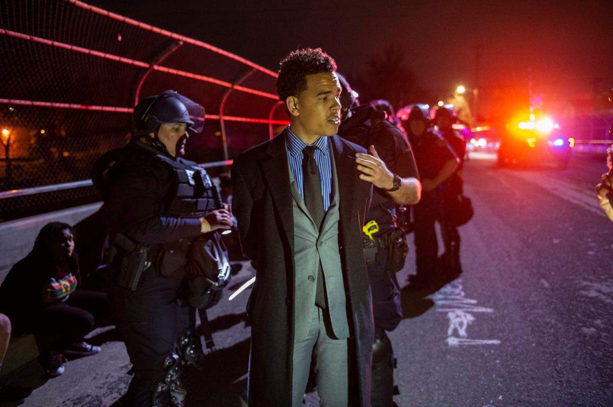 Rev. Shane Harris, president of the People’s Alliance for Justice, is arrested during the Stephon Clark march in the Fabulous 40s in East Sacramento on Monday. The march ended with more than 80 people arrested.