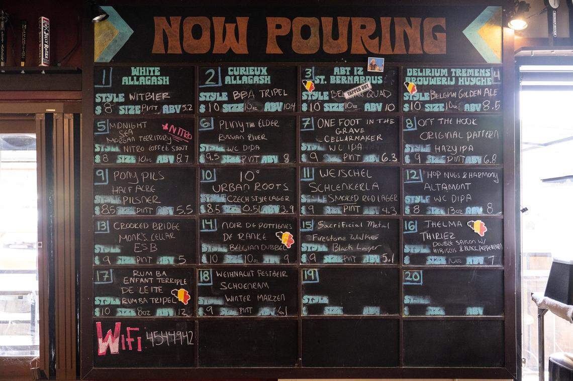 Beers are displayed on a blackboard at Pangaea Bier Cafe last month.