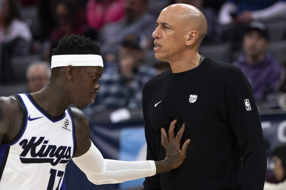 Sacramento Kings guard Dennis Schroder (17) lightly pushes Kings head coach Doug Christie after Christie is given a technical foul during a game at Golden 1 Center in Sacramento on Sunday, Jan. 4, 2026.