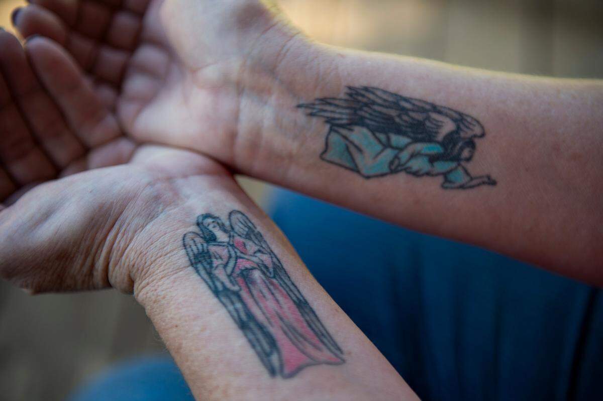Norma Gund of Kettenpom, a rural community in Trinity County, shows tattoos of angels that she has on her wrists in early February, 2018. In 2011, Gund and her husband were stabbed after they received call from the Trinity County sheriff’s office to do a welfare check on a neighbor. Gund survived being stabbed and having her throat slashed by an unstable ex-boyfriend of her neighbor.