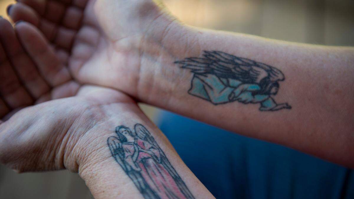 Norma Gund of Kettenpom, a rural community in Trinity County, shows tattoos of angels that she has on her wrists in early February, 2018. In 2011, Gund and her husband were stabbed after they received call from the Trinity County sheriff’s office to do a welfare check on a neighbor. Gund survived being stabbed and having her throat slashed by an unstable ex-boyfriend of her neighbor.