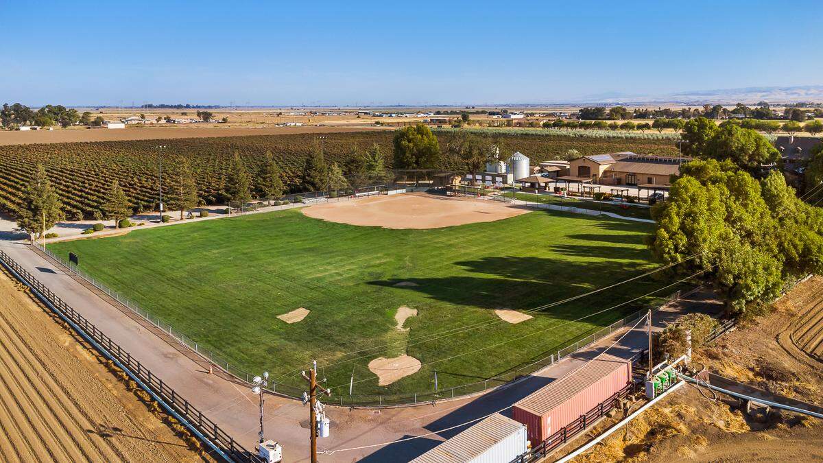 A home-run opportunity is available through an auction for a vineyard estate in Byron, Calif. The Contra Costa County home comes with a baseball field that has hosted Little League tournaments and adult kickball leagues.