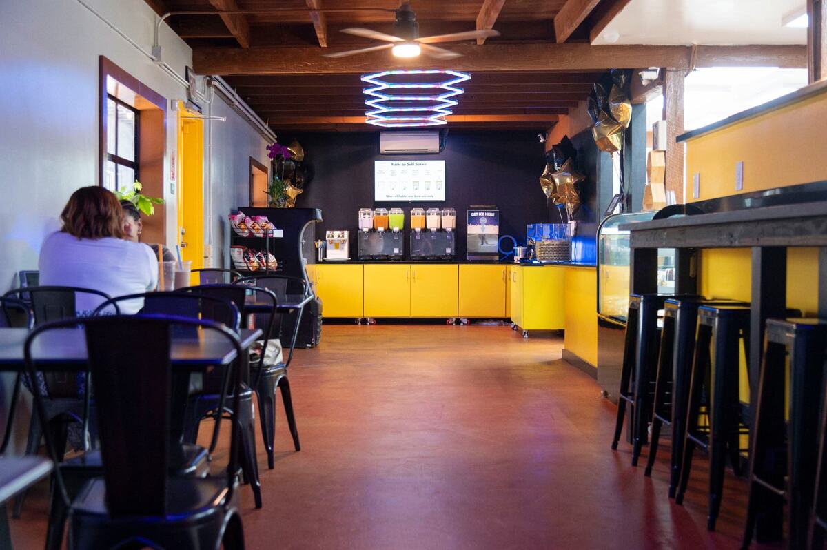 Customers sit at Honeybee Boba Cafe in East Sacramento on Wednesday.